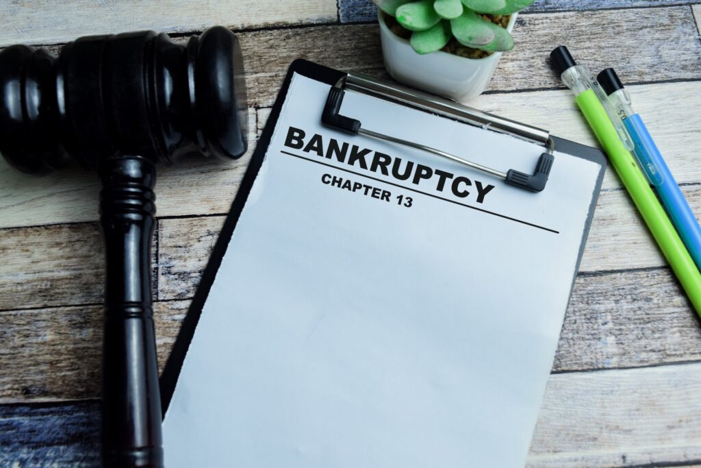 Gavel next to a clipboard that says bankruptcy chapter 13