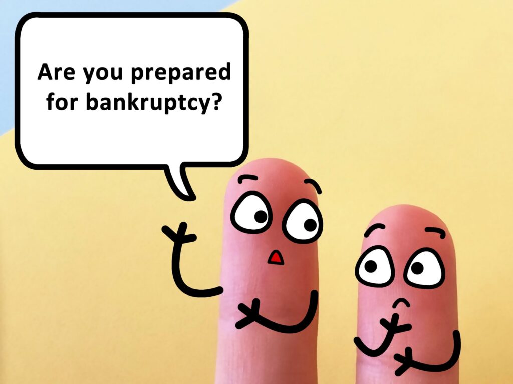 Two fingers are decorated as two person. One of them is asking another if he is prepared for bankruptcy.